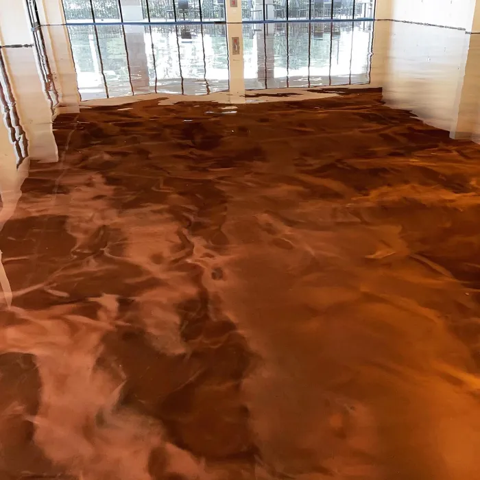 High-sheen flake epoxy garage floor with decorative color blend